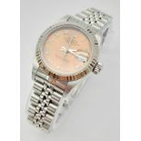 A Rolex Perpetual Datejust Ladies Watch. Stainless steel strap and case - 26mm. Rose gold tone dial.