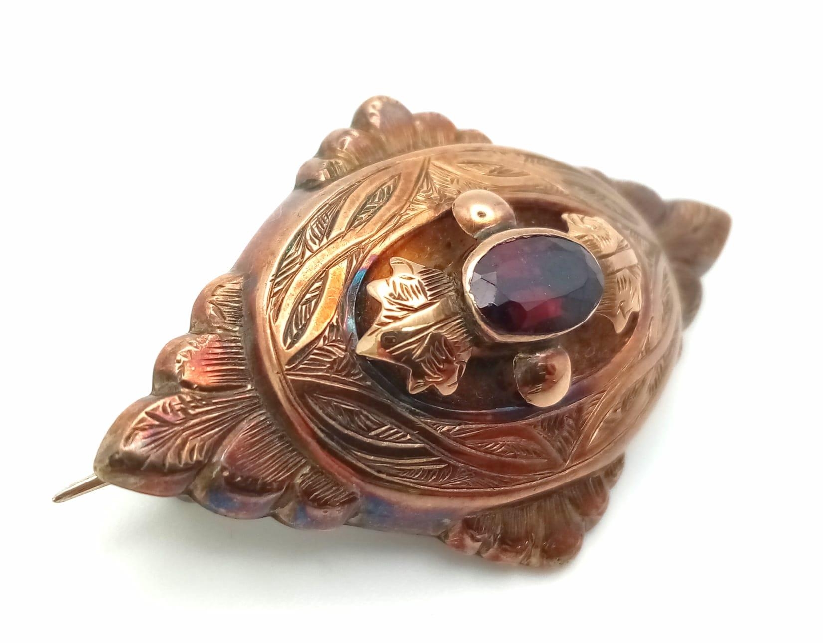 An Antique Victorian Mid Karat Rose Gold Mourning Brooch. Central oval garnet with memento capsule - Image 2 of 3