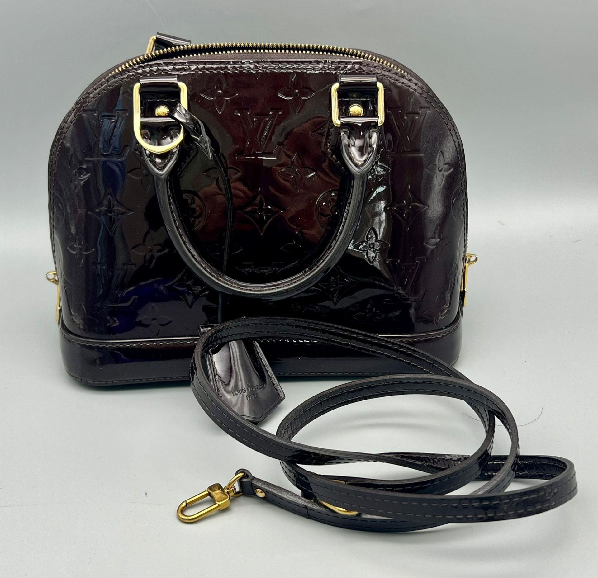 A Louis Vuitton Burgundy Patent Leather Handbag. Monogram LV patent leather, gold-tone hardware. - Bild 6 aus 6