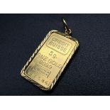 A 5g Fine Gold (.999.9) Pendant - Frame set in 14k Gold. Total weight - 5.9g.