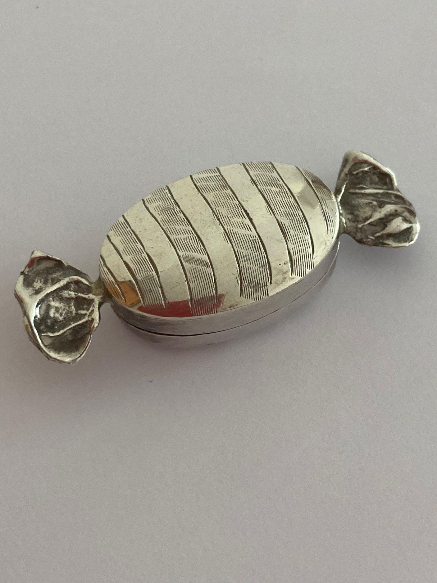 Vintage Rare and unusual SILVER PILL BOX in the form of a wrapped toffee. Having full UK hallmark. - Image 2 of 6