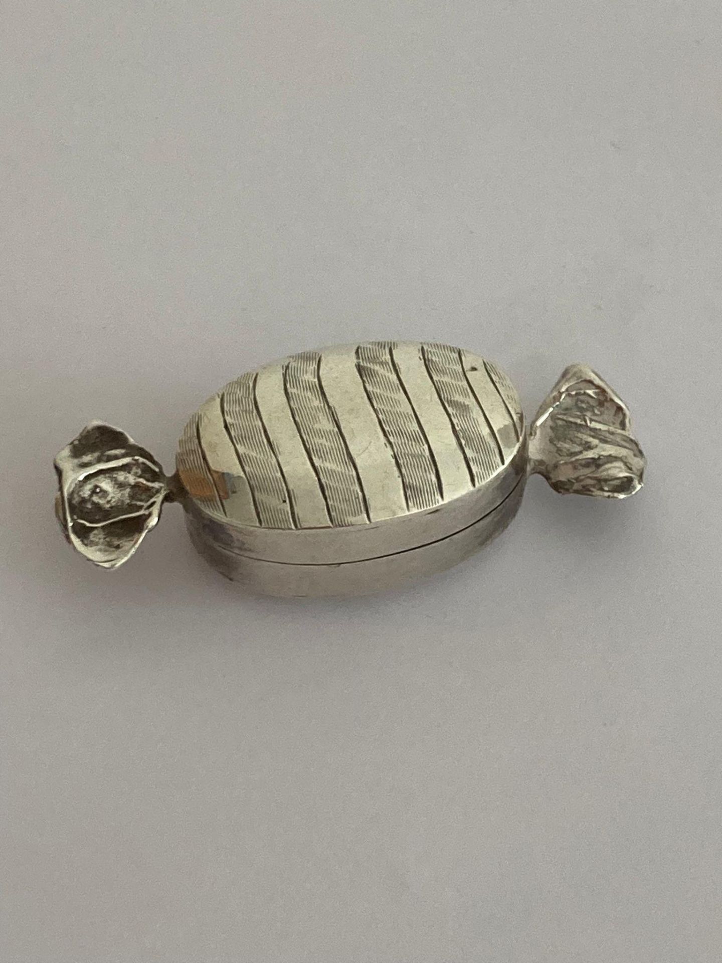 Vintage Rare and unusual SILVER PILL BOX in the form of a wrapped toffee. Having full UK hallmark. - Image 5 of 6