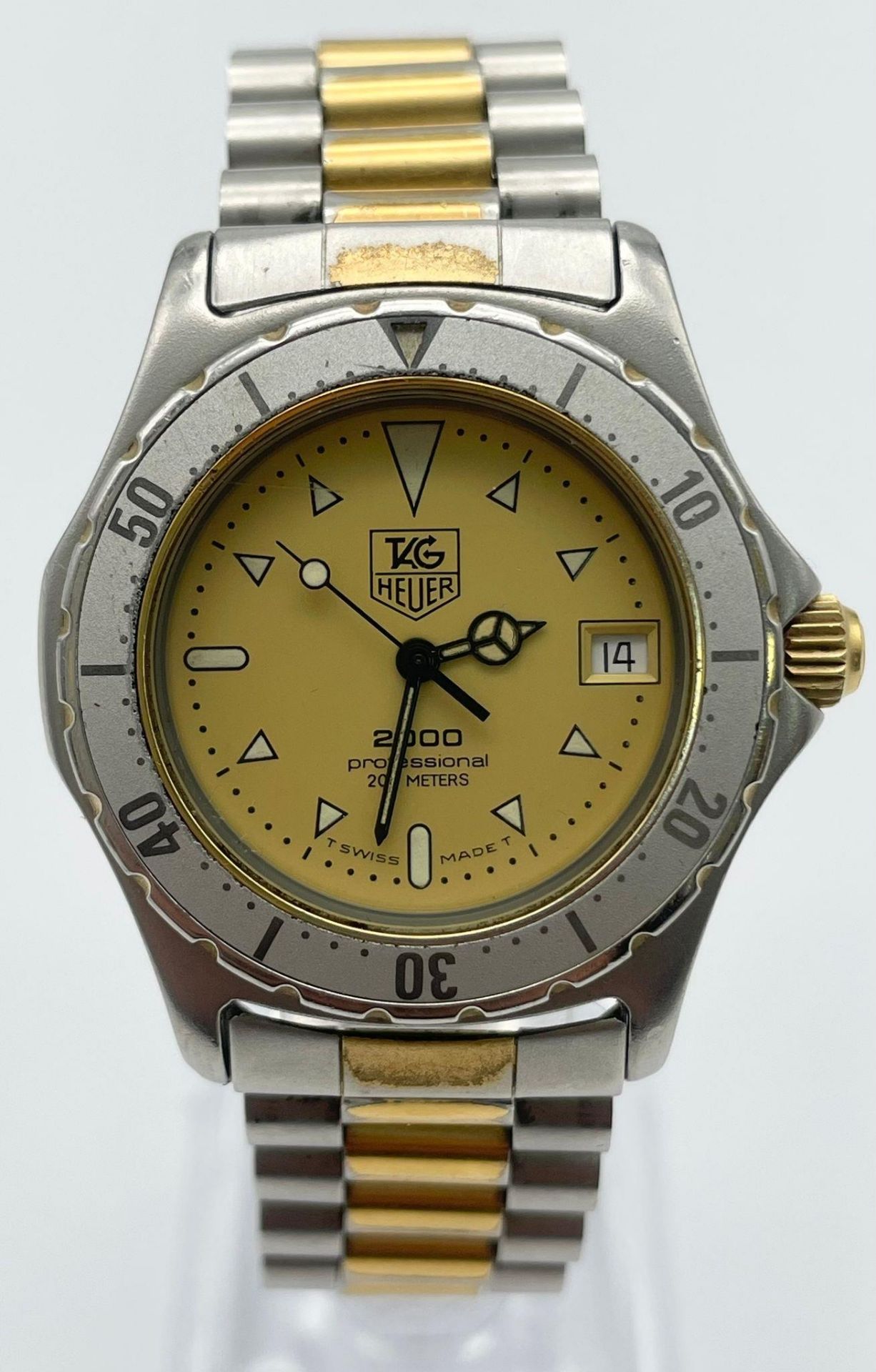 A Tag Heuer 2000 Professional 200m, Swiss Made, Stainless Steel Bracelet Watch. Gold Tone, Yellow