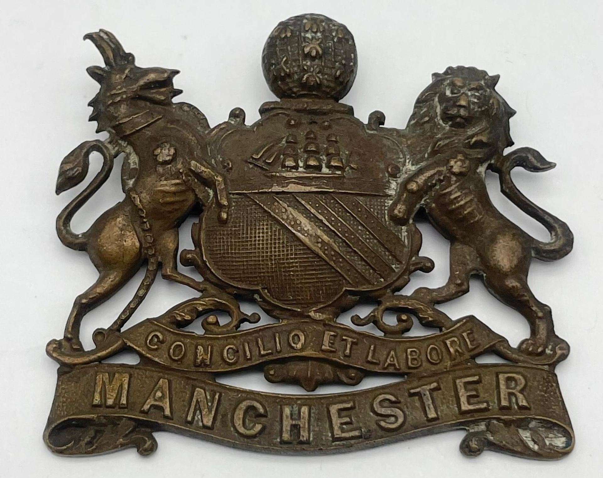 Three British Military Cap Badges: WW1 Dorsetshire Regiment Corp, WW2 Royal Artillery Manchester and - Image 4 of 6