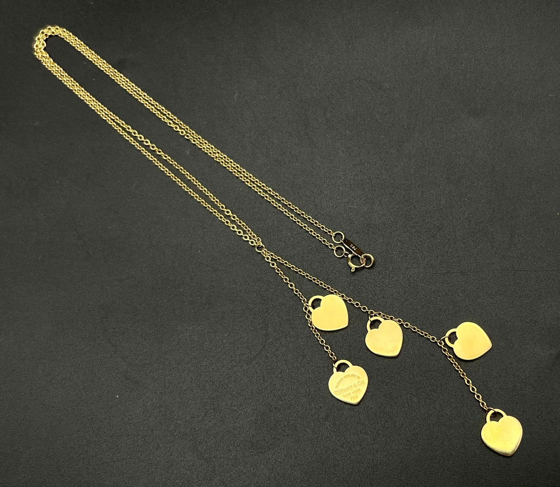 A Tiffany and Co 18K Yellow Gold Five-Heart Necklace. 40cm - necklace. 8cm - hearts attachment. - Image 4 of 4