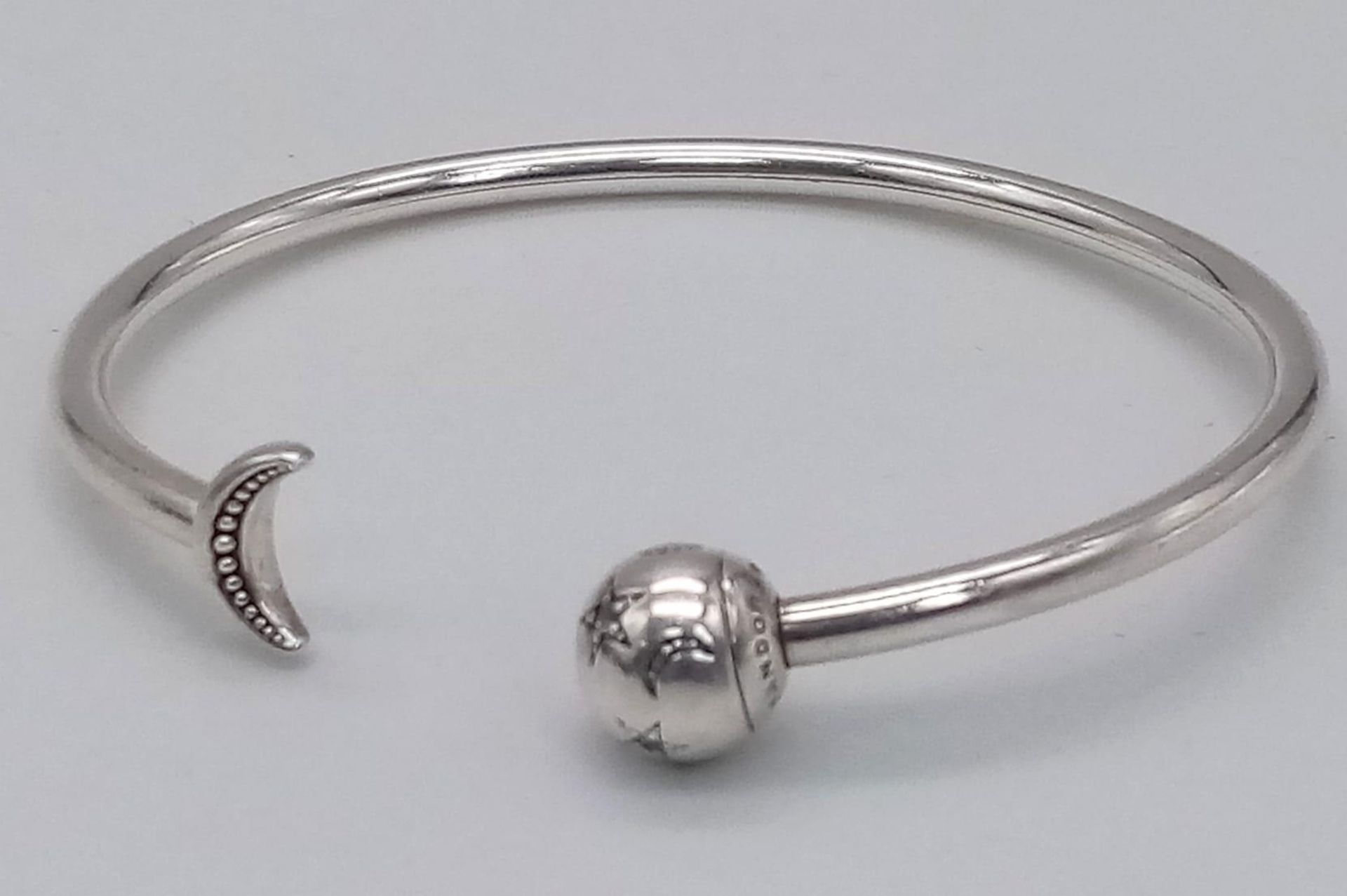 PANDORA STERLING SILVER MOON & STARS STONE SET BANGLE, WEIGHT 8.4G