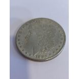 Please read all of the following. This United States 1882 Morgan dollar Has markings for rare Carson