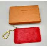 A Louis Vuitton Small Red Textured Epi Leather Key Pouch. As new, in original LV packaging. 12cm x