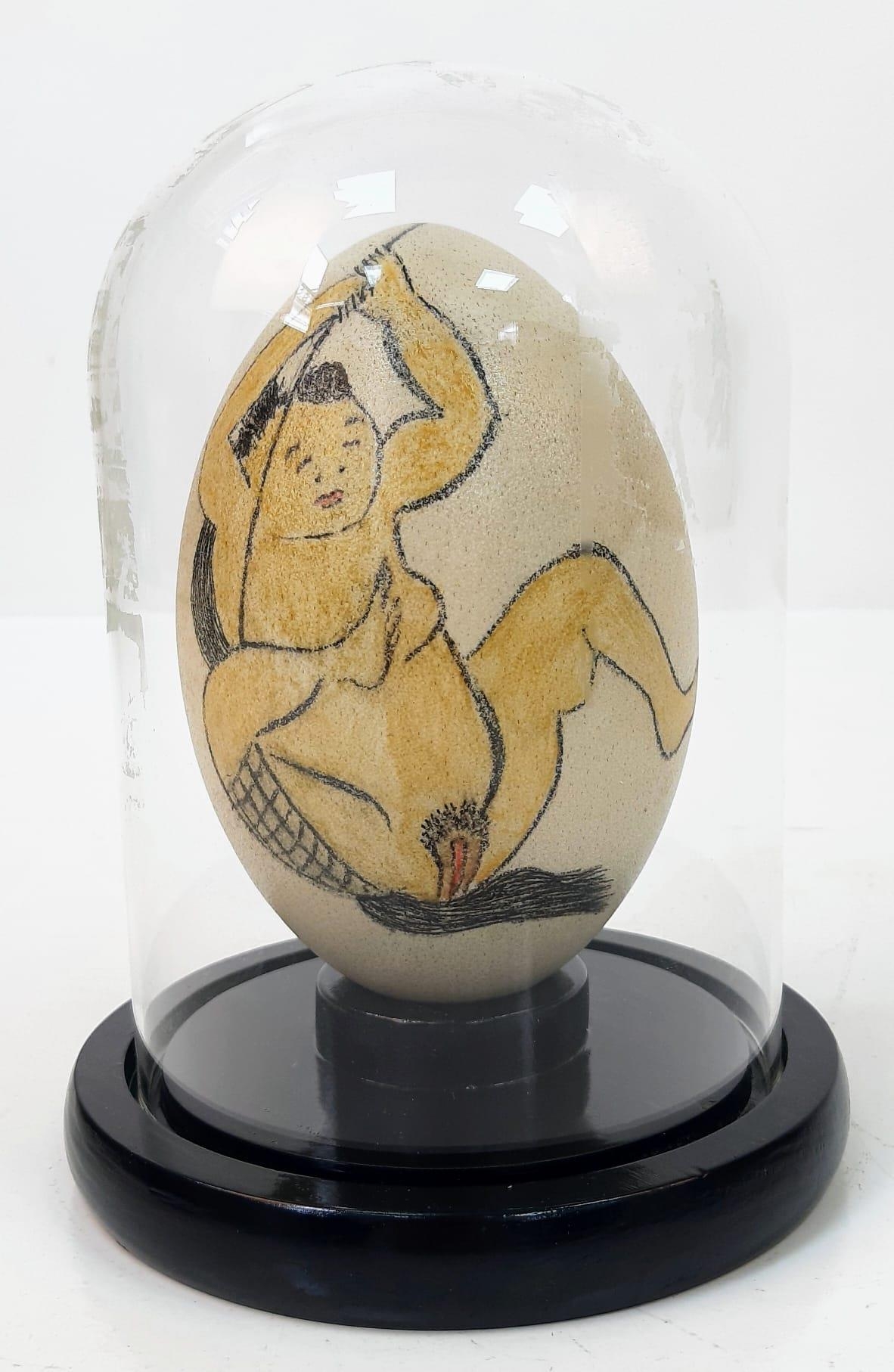 A Japanese, hand painted, ostrich egg, depicting a humorous (and acrobatic) erotic scene after the - Image 2 of 6