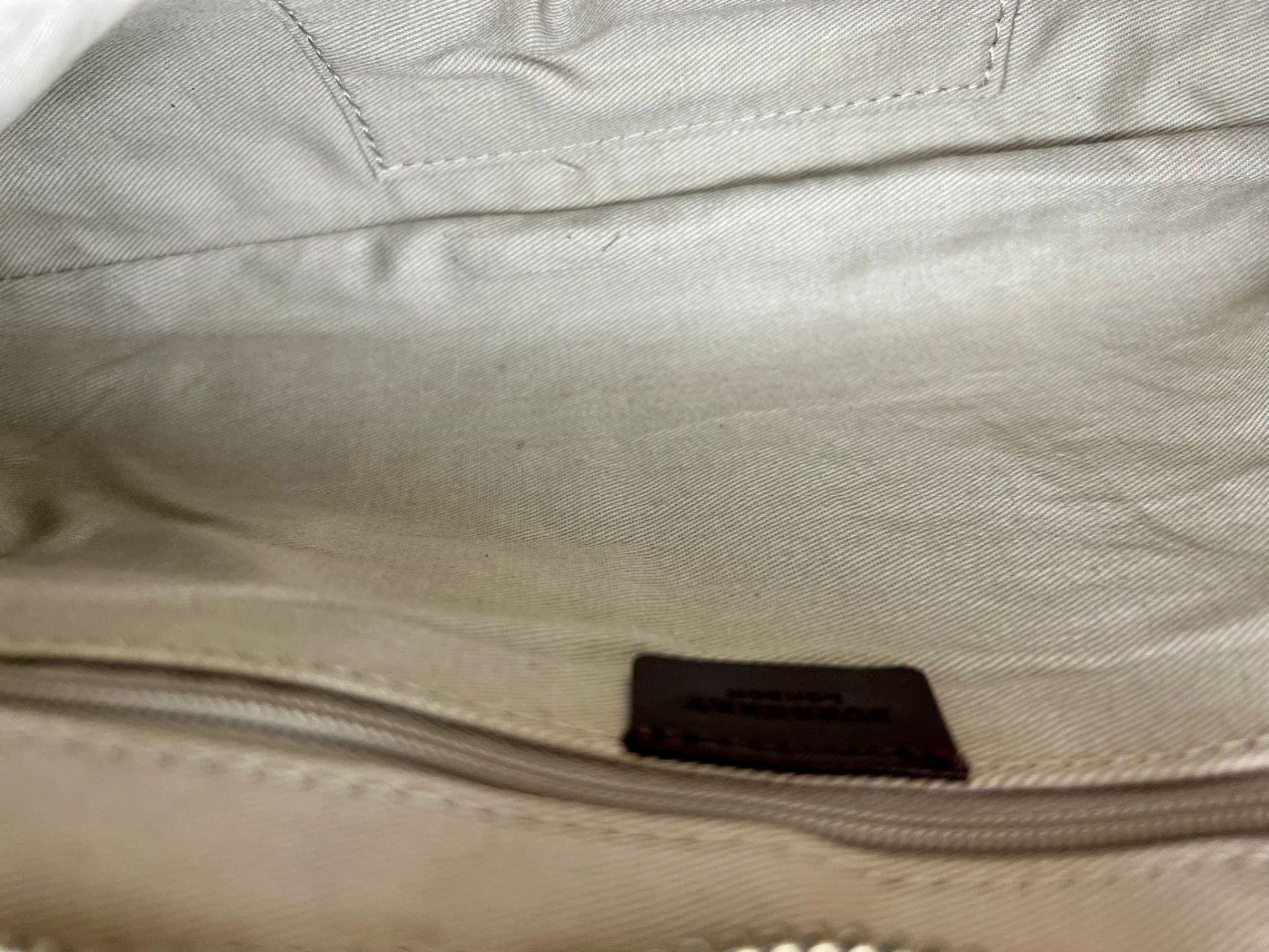 A Burberry Baguette Pouch Bag. Exterior beige canvas with leather handle and trim. Textile - Bild 4 aus 6