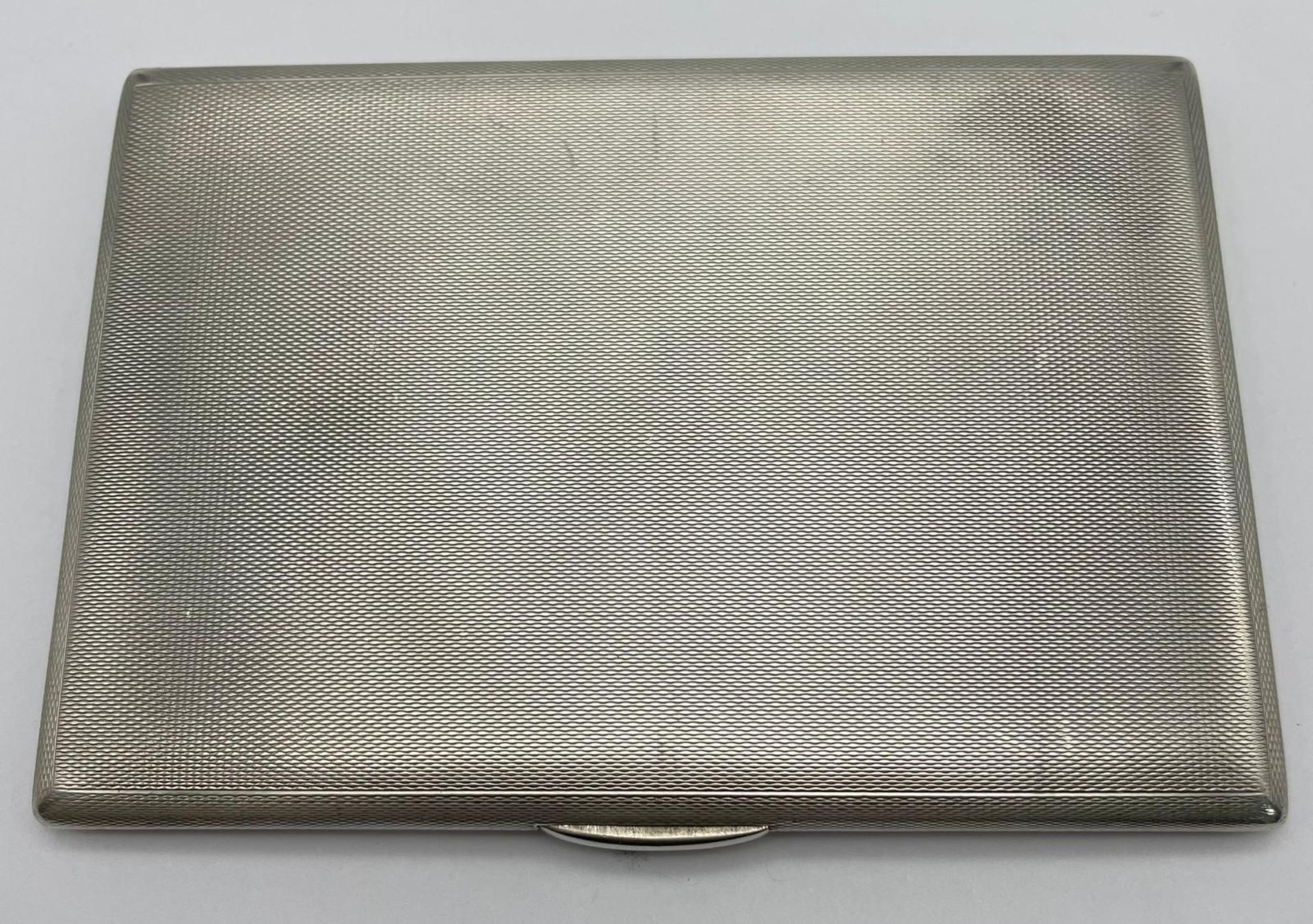 A Silver Cigarette Case. Weighs 200g. 12.5cm x 8.5cm. - Image 3 of 4