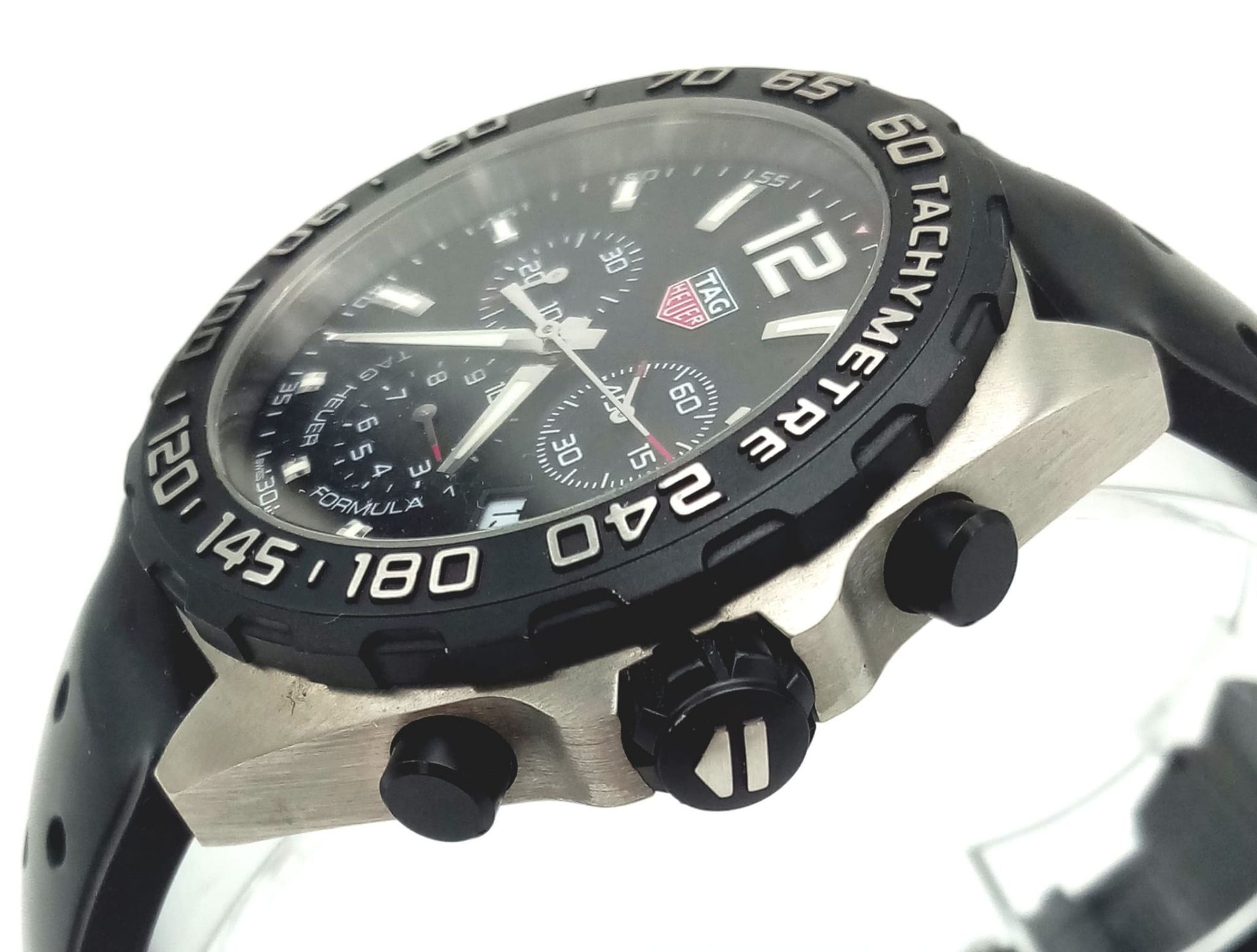 A Tag Heuer Formula Gents Chronograph Watch. Black rubber strap. Black dial with three sub dials. - Image 6 of 7