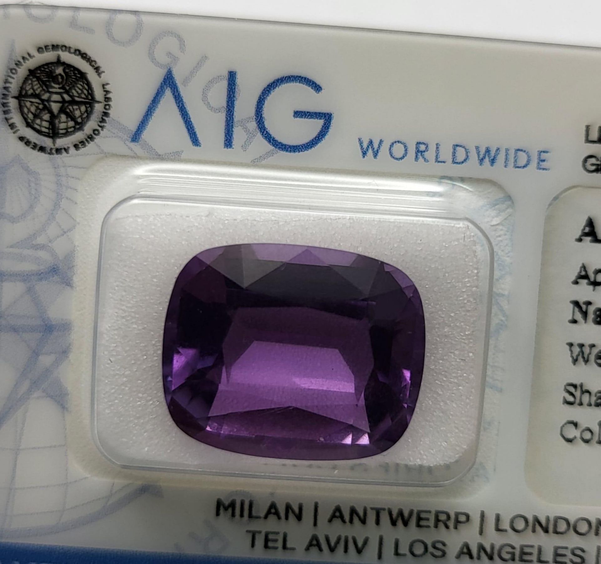 A 10.28ct Loupe-Clean Cushion-Faceted Amethyst Gemstone. Sealed and AIG Milan Certified.