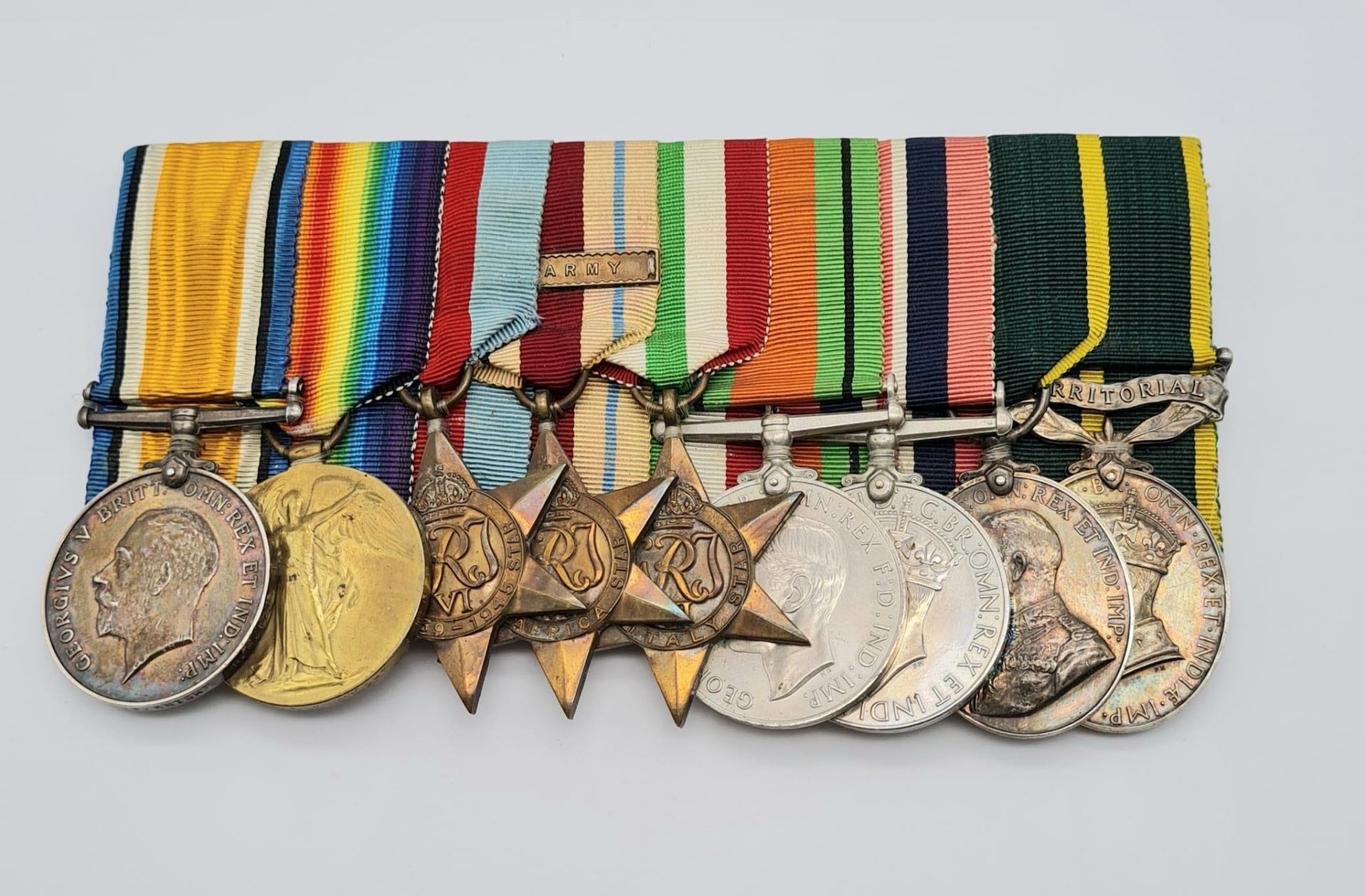 Group of nine medals awarded to Private and later Warrant Officer Class 2 Leonard Wilfred Knight who