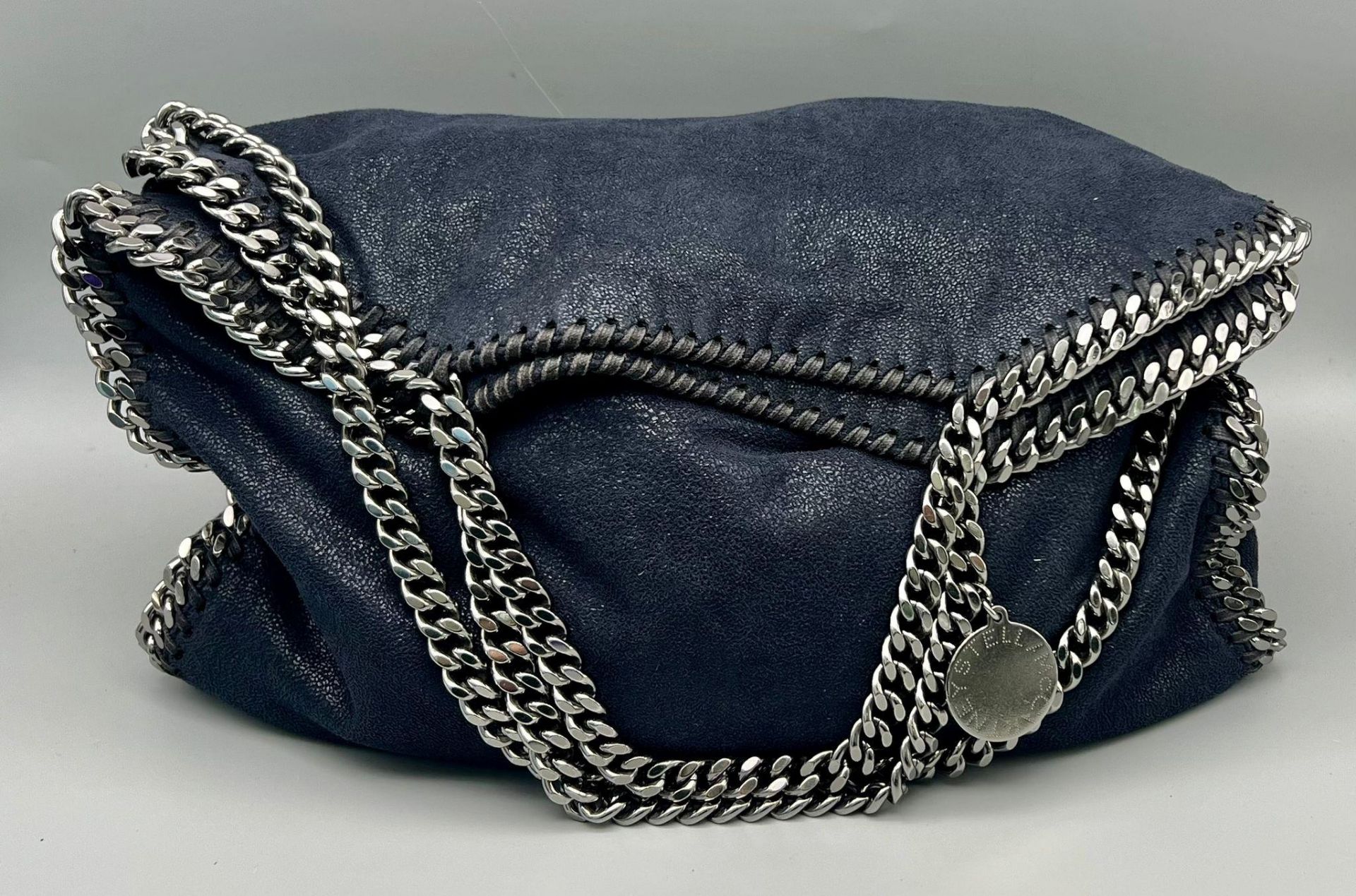 A Stella McCartney Falabella Shoulder/Tote Bag. Navy pvc with silver-tone heavy hardware. Monogram