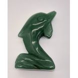 A Green Jade Dolphin Figurine. 5cm tall.