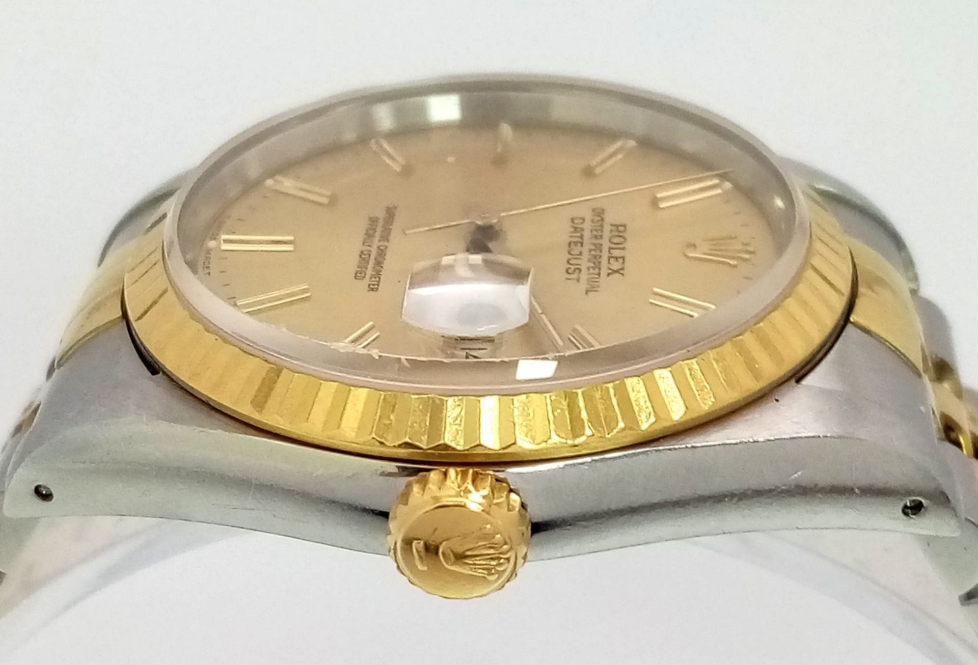 A Rolex Oyster Perpetual Datejust Gents Watch. Bi-metal strap and case - 36mm. Gold tone dial. - Image 4 of 5