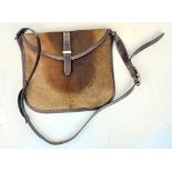 A Gucci Leather and Pony Hair Large Shoulder/Cross-body Bag. Adjustable strap. Gold-tone hardware.