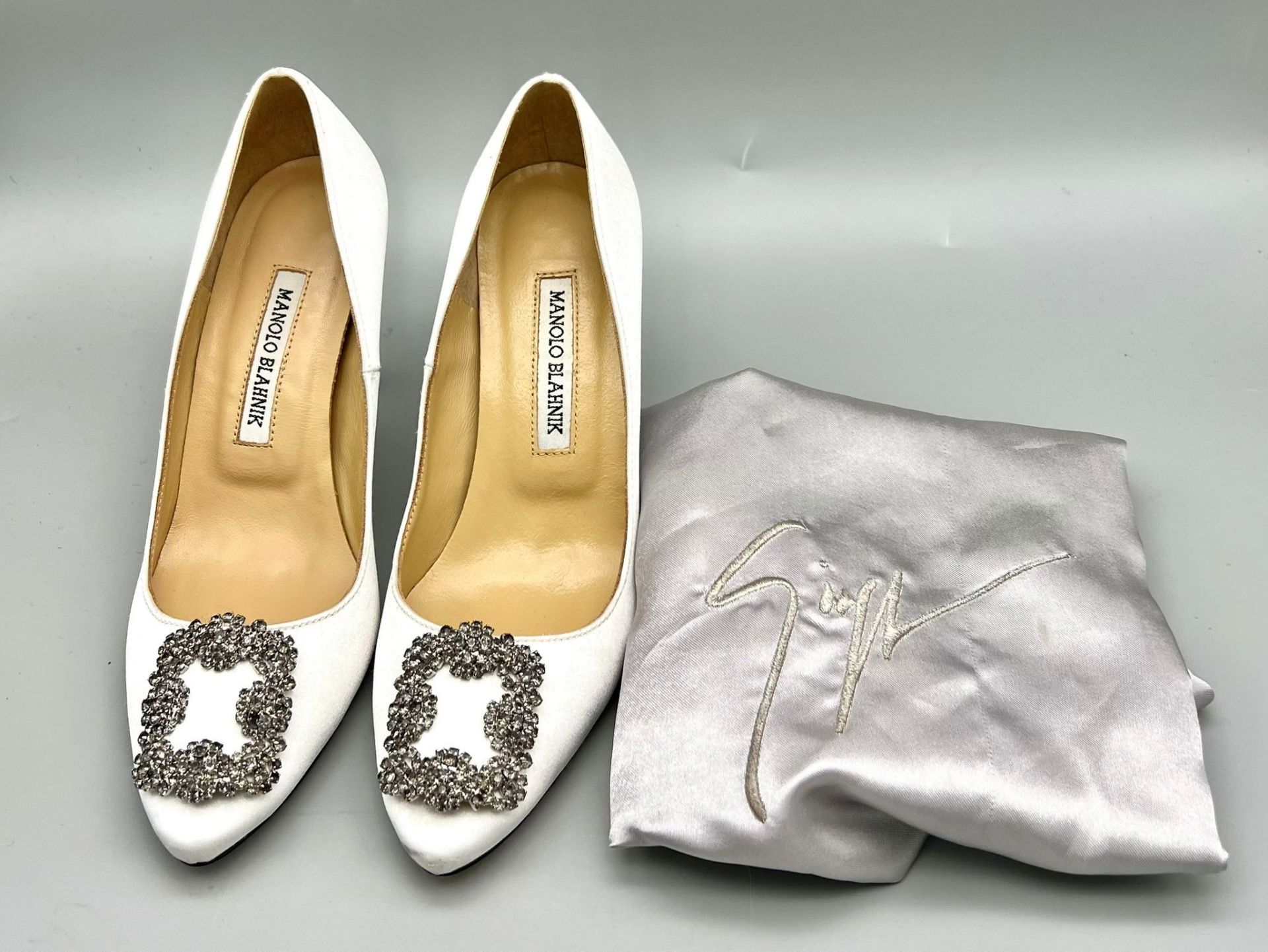 A Pair of Hand-Made Italian Manolo Blahnik White Ladies Shoes with White Stone Decoration. Good