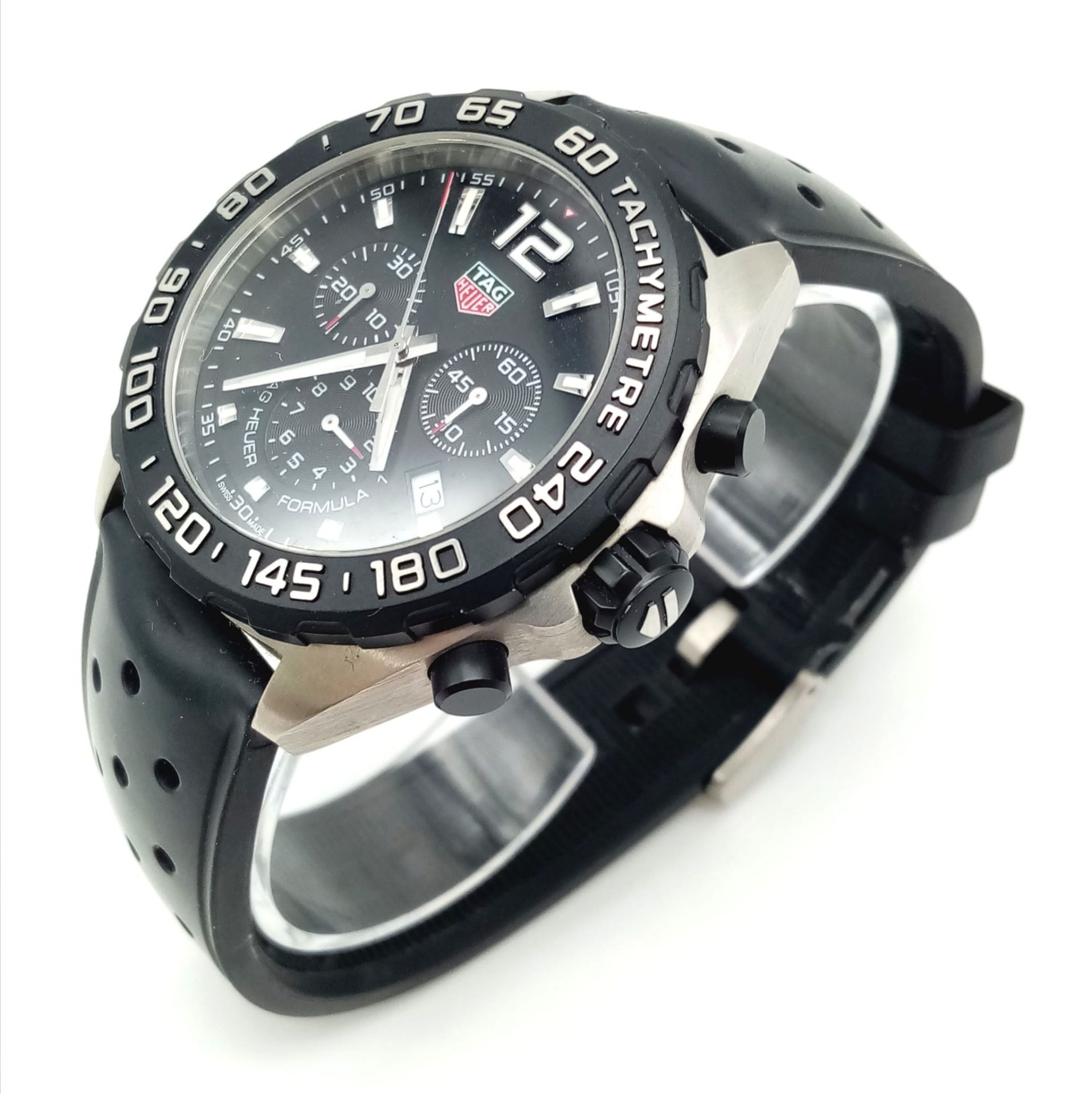 A Tag Heuer Formula Gents Chronograph Watch. Black rubber strap. Black dial with three sub dials. - Image 2 of 7