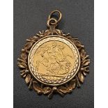 22k yellow gold full Sovereign coin with Queen Victoria dated 1900, set into a 9ct yellow gold