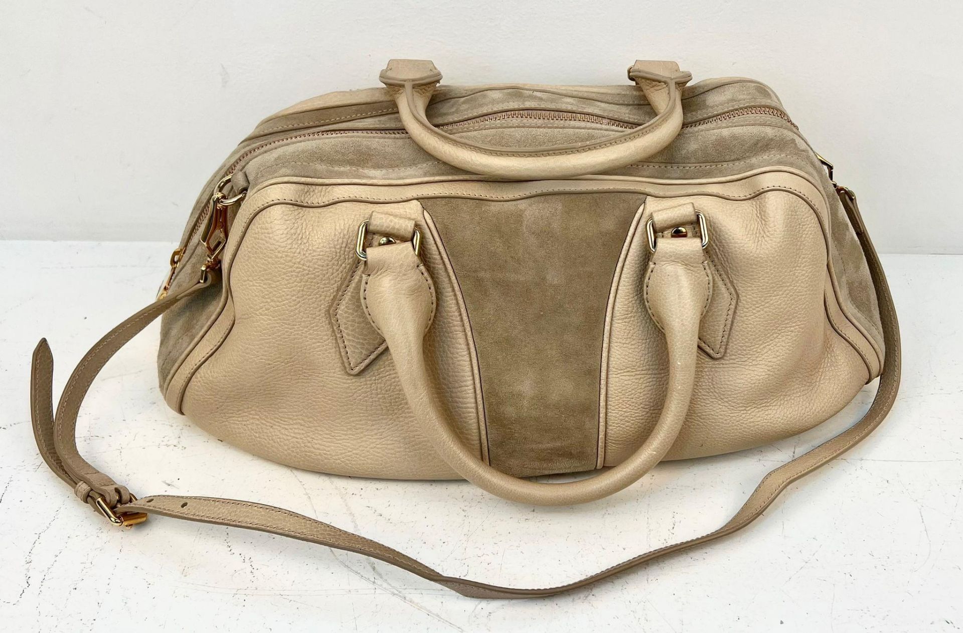 A Burberry Leather and Suede Satchel Bag. Beige soft leather and suede exterior. Shoulder/cross-body