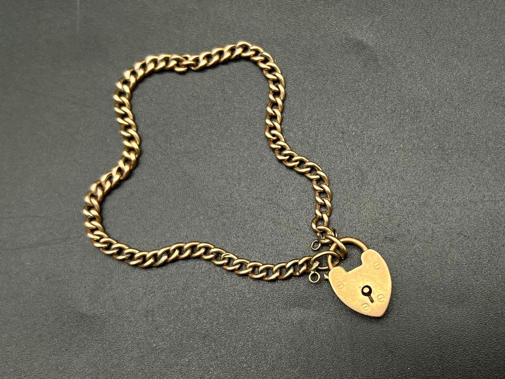 A Vintage 9K Rose Gold Bracelet with Heart Clasp. 20cm. 6.07g