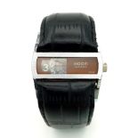 A Rare Vintage Hoga Directime Automatic Gents Jump Watch. Black leather strap. Stainless steel