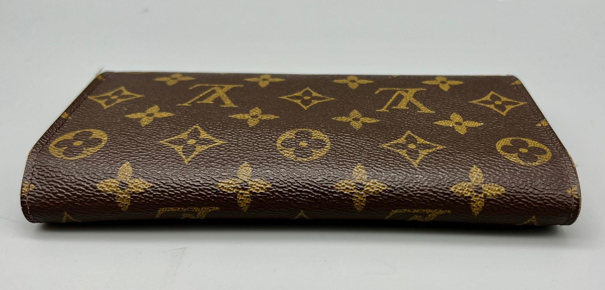 A Louis Vuitton Monogram Canvas Wallet. 19cm x 10cm. Please see photos for conditions. Ref: 12764 - Image 3 of 8