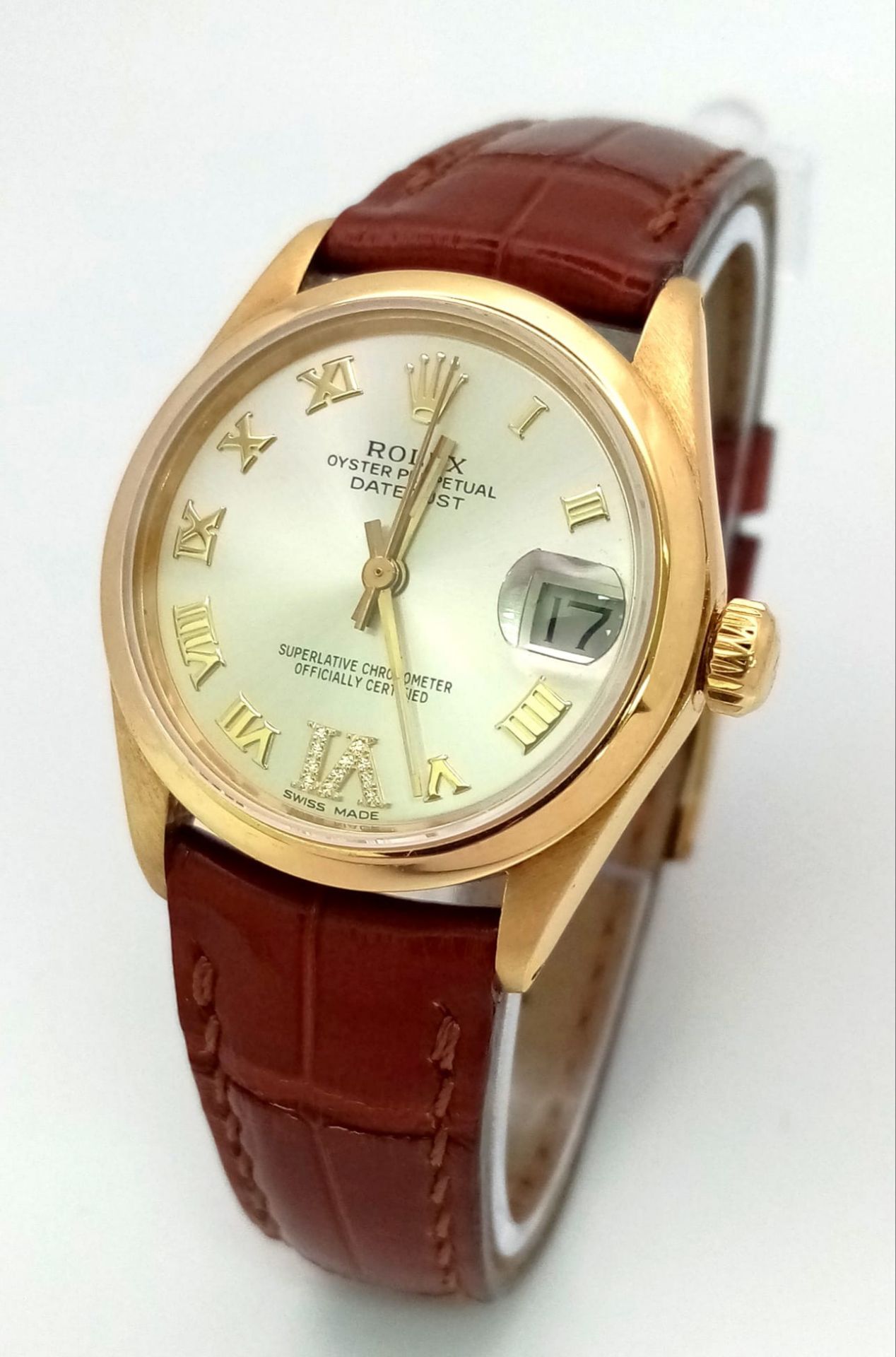 A Rolex Perpetual Oyster 18K Gold Cased Datejust Ladies Watch. Brown leather strap. 18K gold