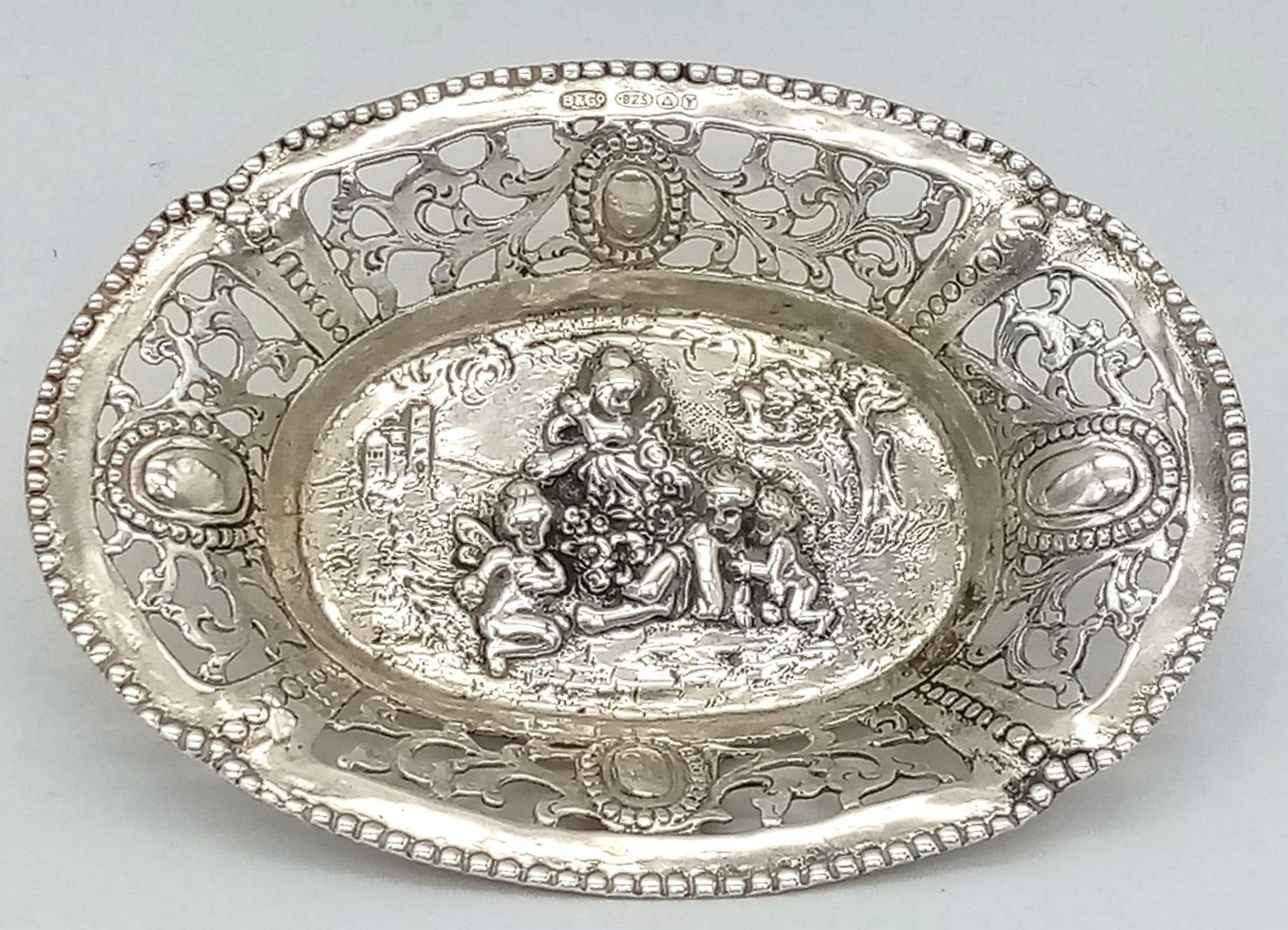 A Beautiful Vintage Silver Repousse Miniature tray. Pierced and cherubic decoration. Hallmarks for