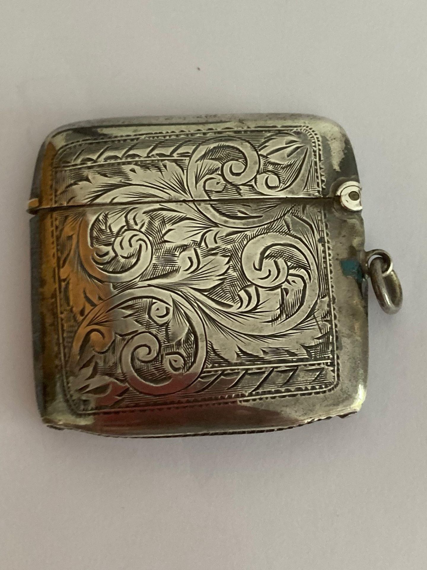 Antique SILVER VESTA in nice condition with beautiful design work to back and front. Having clear