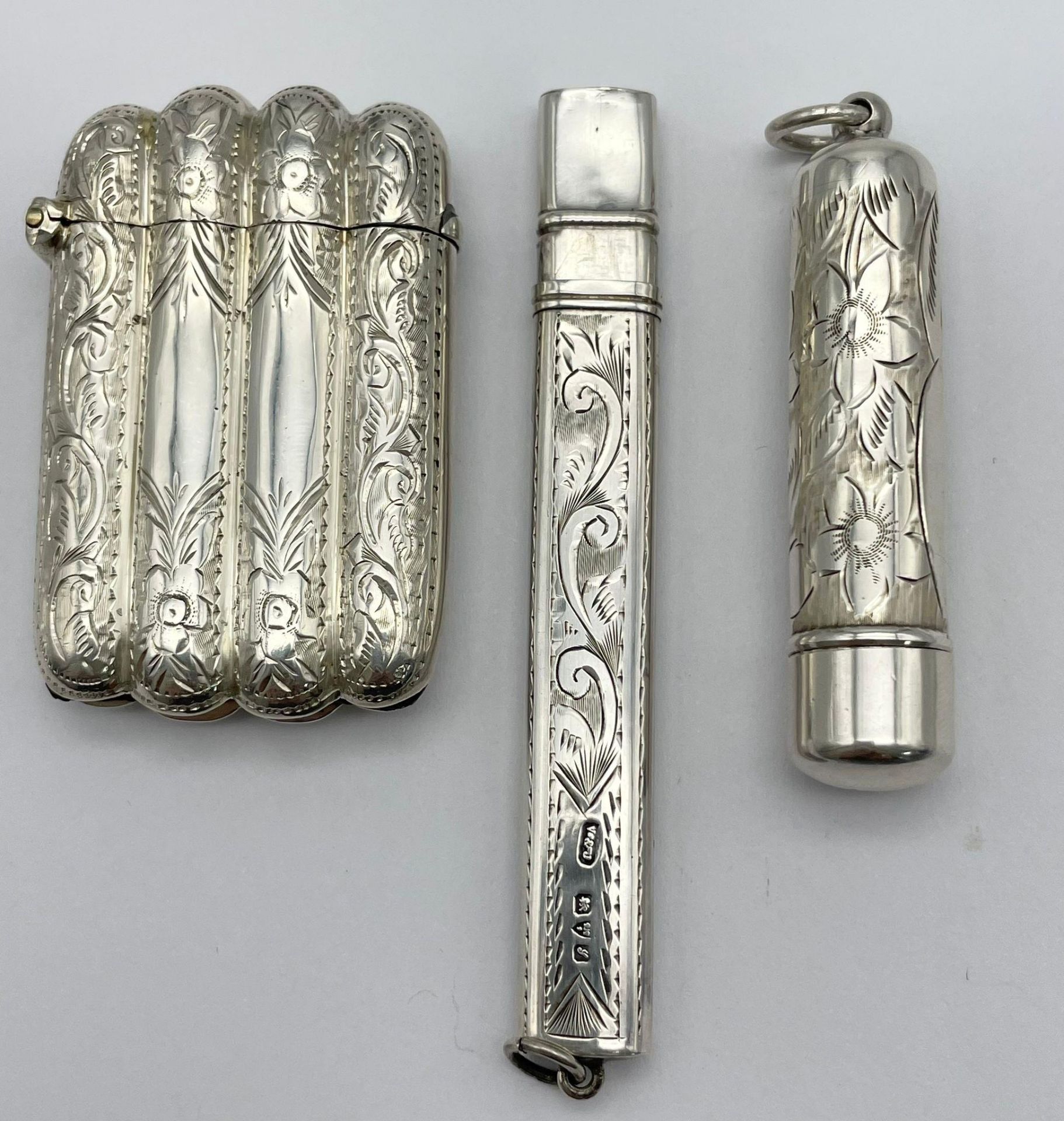 A Silver Selection to Include, A Silver Pencil Holder with Original Pencil, A Silver Cheroot and