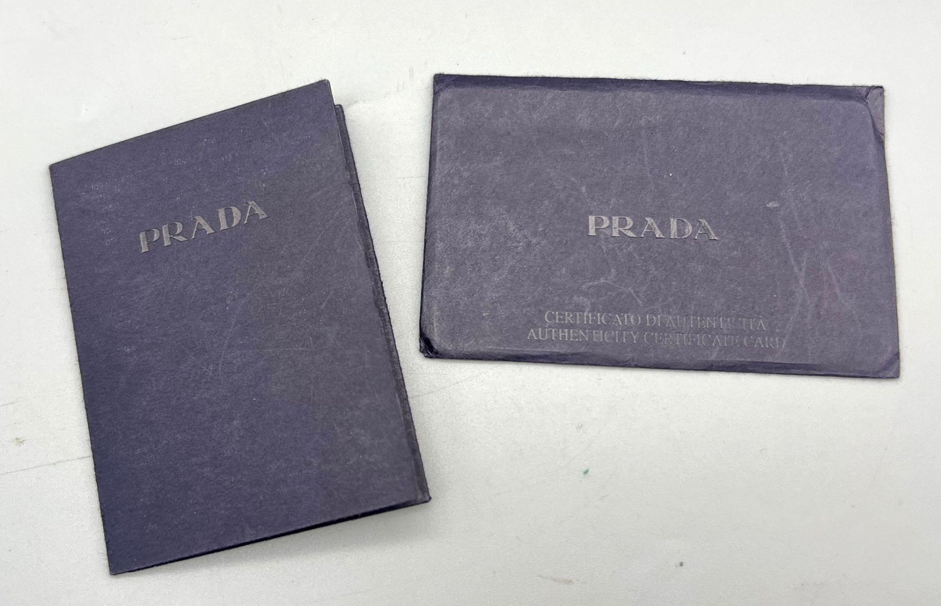A Prada Black Leather Mini Handbag. Classic shape with twin handles. Prada metal logo. Comes with - Bild 6 aus 7