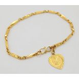 A 22K Yellow Gold Bar-Link Bracelet with Heart Charm. 16cm 7.68g