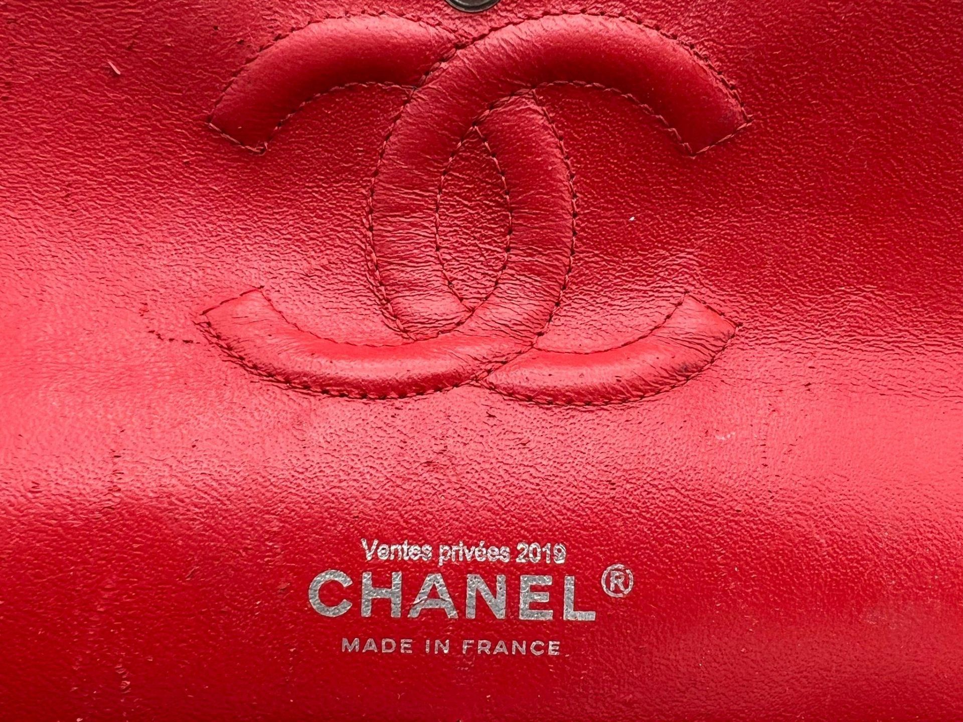 A Chanel Patent Leather Flap Handbag. Bright red patent leather quilted exterior. Classic Chanel - Image 5 of 7