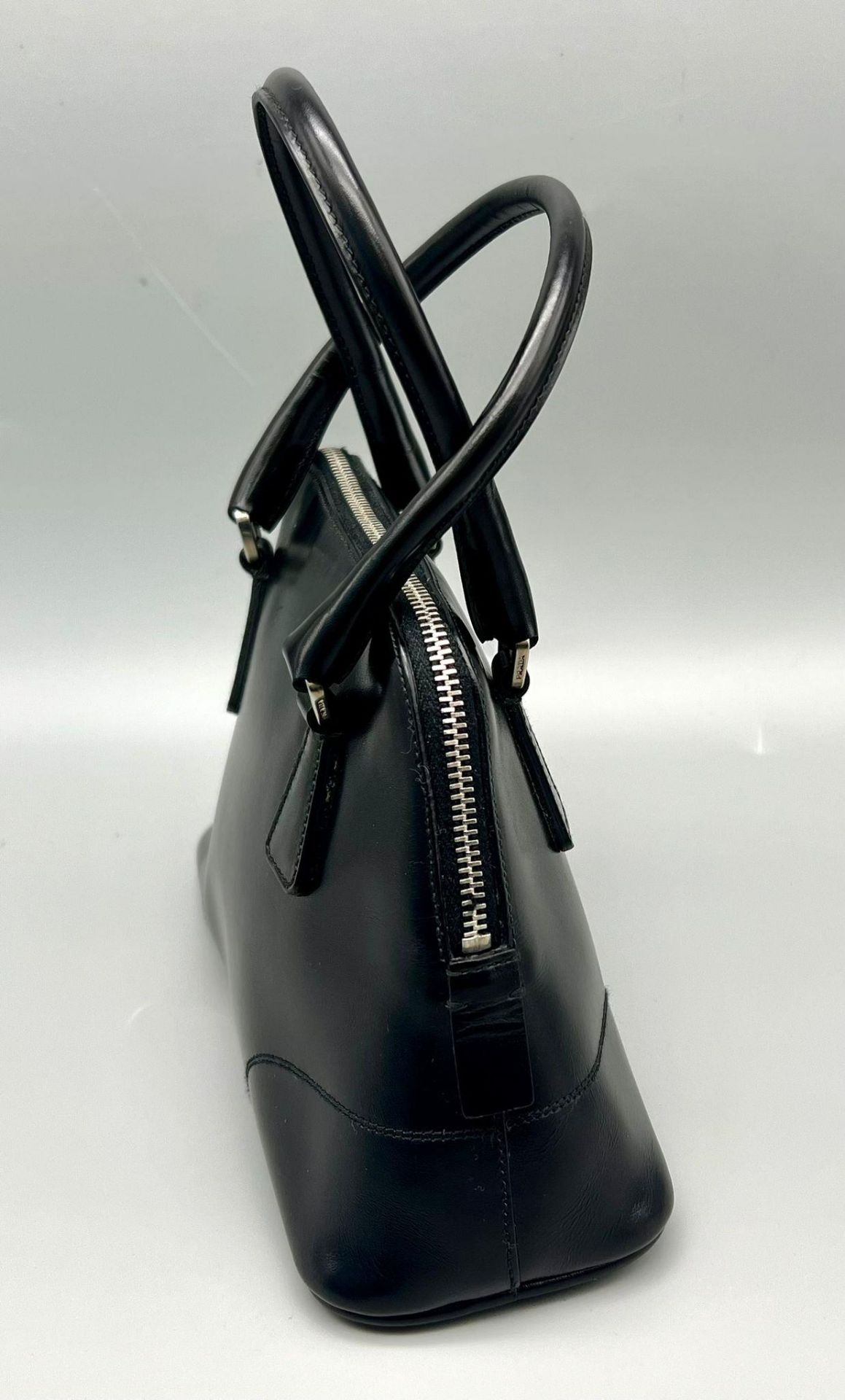 A Prada Black Leather Mini Handbag. Classic shape with twin handles. Prada metal logo. Comes with - Bild 3 aus 7