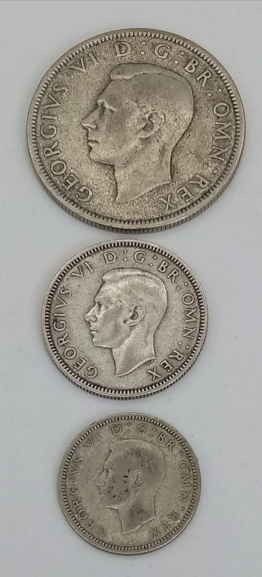 A Parcel of Three 1939 Dated British Silver Coins Comprising; 1 x Half Crown, 1 x One Shilling and 1 - Image 2 of 2