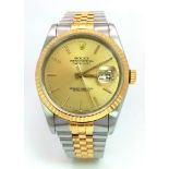 A Rolex Oyster Perpetual Datejust Gents Watch. Bi-metal strap and case - 36mm. Gold tone dial.