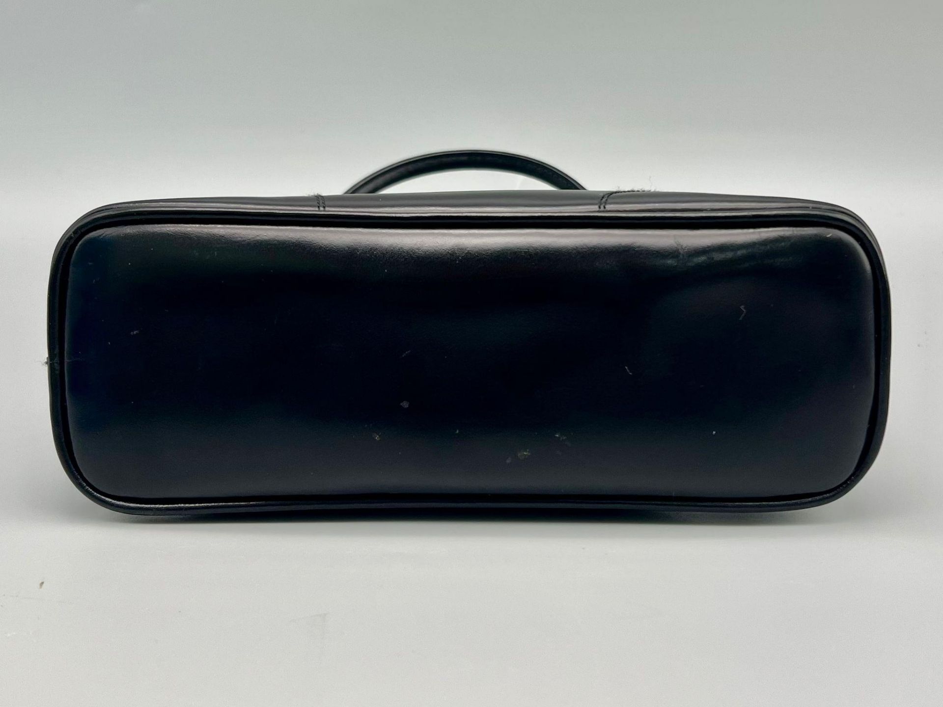 A Prada Black Leather Mini Handbag. Classic shape with twin handles. Prada metal logo. Comes with - Bild 4 aus 7