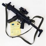 A Deactivated H and K 9mm Sub Machine Gun. 8.5 inch barrel length. Twin magazines. Fitted sight