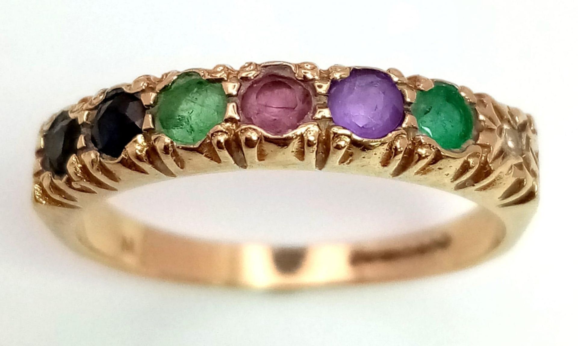 9k yellow gold 'Dearest' multi gemstone ring, set with diamond, emeralds, amethyst, ruby, sapphire