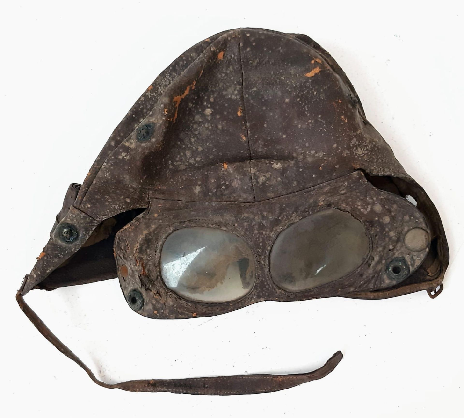 A WW1 Flying Helmet and Attached Goggles. Not in the best shape but please see photos.
