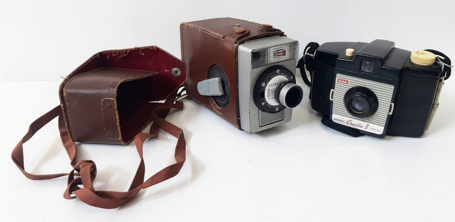Two Vintage Kodak Cameras. A Brownie Cresta II and a Brownie Movie Camera with Leather Case. A/F