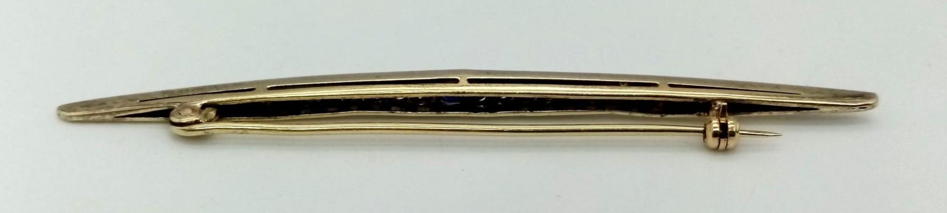 An antique yellow and white gold brooch with old cut diamonds and a blue sapphire. Length: 80 mm. In - Image 4 of 4