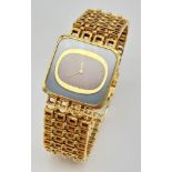 A Vintage 18K Gold Patek Phillipe Art Deco Style Dress Watch. 18K gold bracelet and case - 25mm.