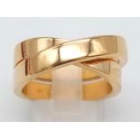 CARTIER 18K YELLOW GOLD CROSS OVER RING WITH ORIGINAL PAPERWORK, WEIGHT 15.1G SIZE O