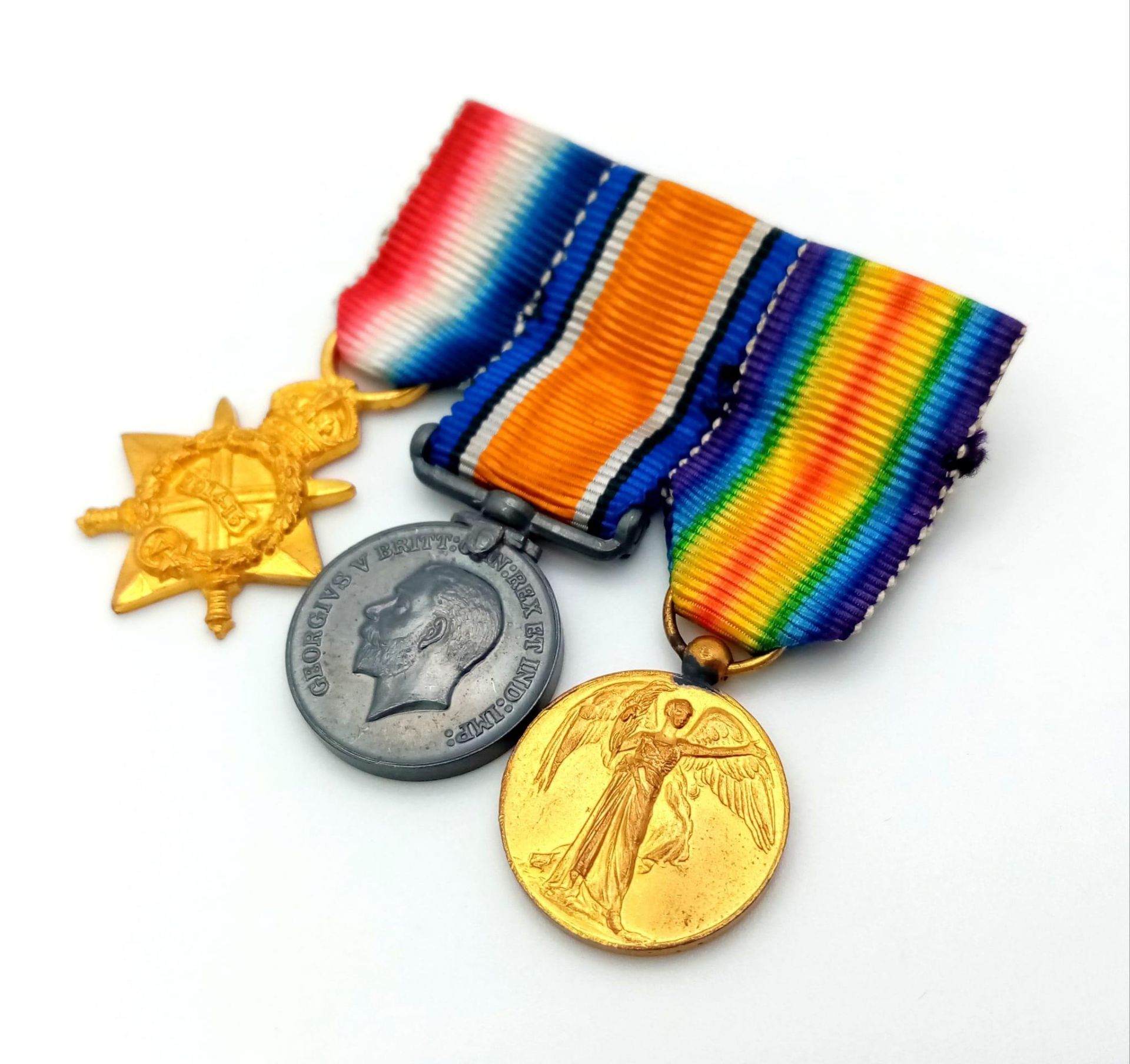 A Miniature Three Medal WW1 Bar Awarded to Captain F.H. Bentley of the West Yorkshire Regiment.