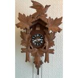 A Vintage Chalet Style Black Forest Cuckoo Clock in Good Working Order. 25cm x 42cm.