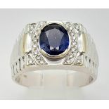 An 18K white gold ring, ROLEX style, with an oval cut sapphire (1.70 carats). ring size: S1/2,